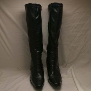 Black pleather knee high boots.